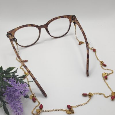 Chaîne à lunettes - Perles rouges et or - sequins présentés sur lunettes