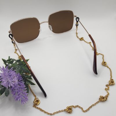 Chaîne à lunettes - Fleur de Mobius -présentée sur lunettes