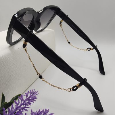 Bijoux de branches - Pierre naturelle noire - Présentation sur lunettes