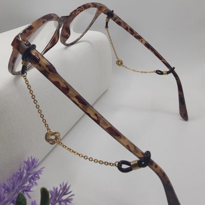Bijoux de branches - Fleur de Mobius - Présentation sur lunettes